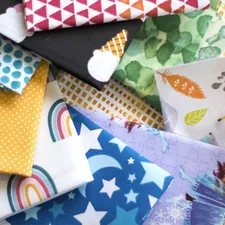 An assortment of fat quarter fabric cuts. related to Sewing Made Easy: Free Valance Patterns to Get You Started