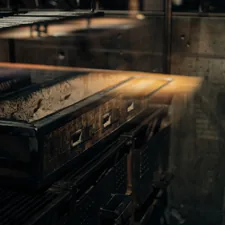 an industrial kitchen with a large metal oven related to Elevate Your Space with Industrial Style Sideboards