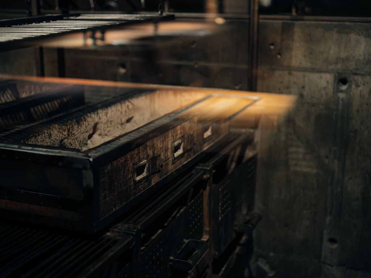 an industrial kitchen with a large metal oven related to Industrial Elegance: Reviving Vintage Metal in Modern Sideboards