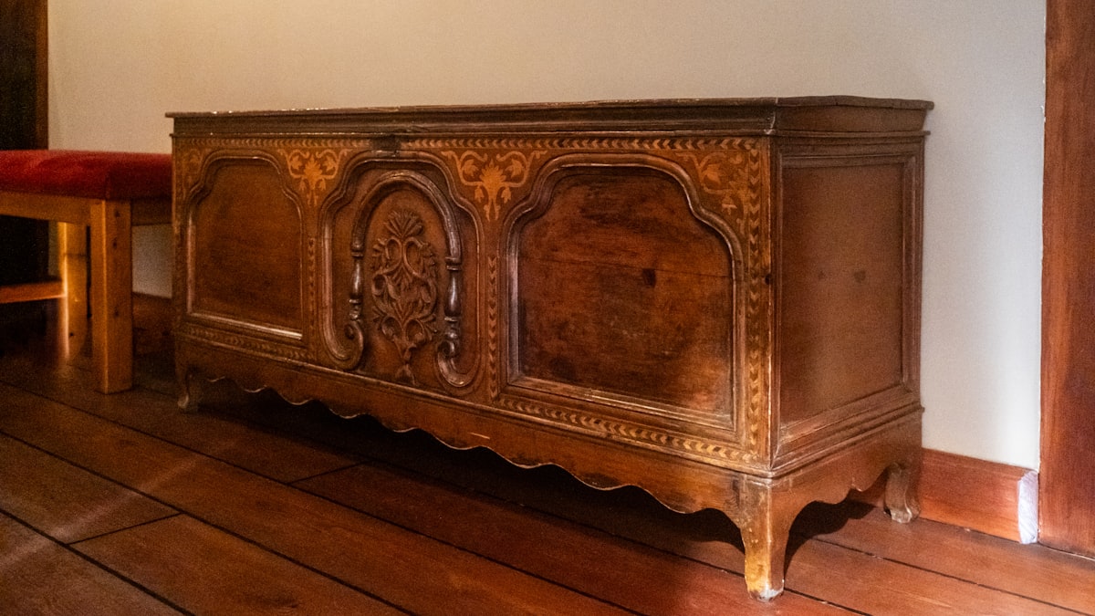 Antique wooden chest with intricate carvings and ornate details. related to The Ultimate Guide to Incorporating a 72 Inch Sideboard in Your Home
