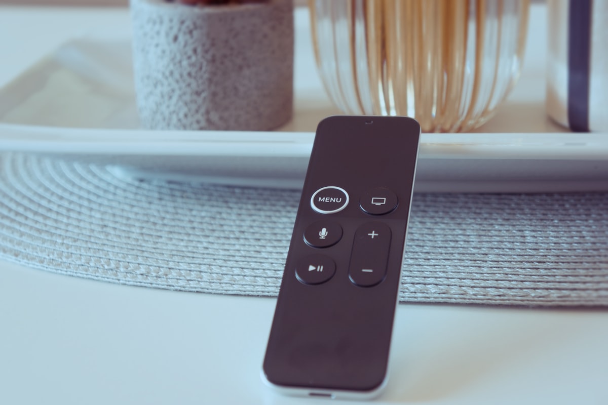 Apple TV remote related to Organize Your Space with a Bedside Remote Control Holder
