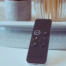 Apple TV remote related to Organize Your Space with a Bedside Remote Control Holder