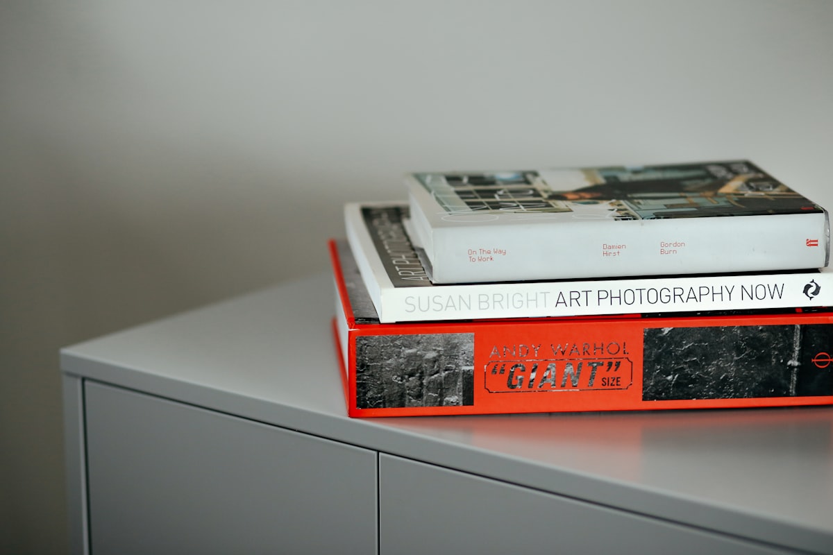 Art books stack related to The Beauty and Functionality of Buffets & Sideboards