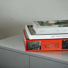 Art books stack related to The Beauty and Functionality of Buffets & Sideboards