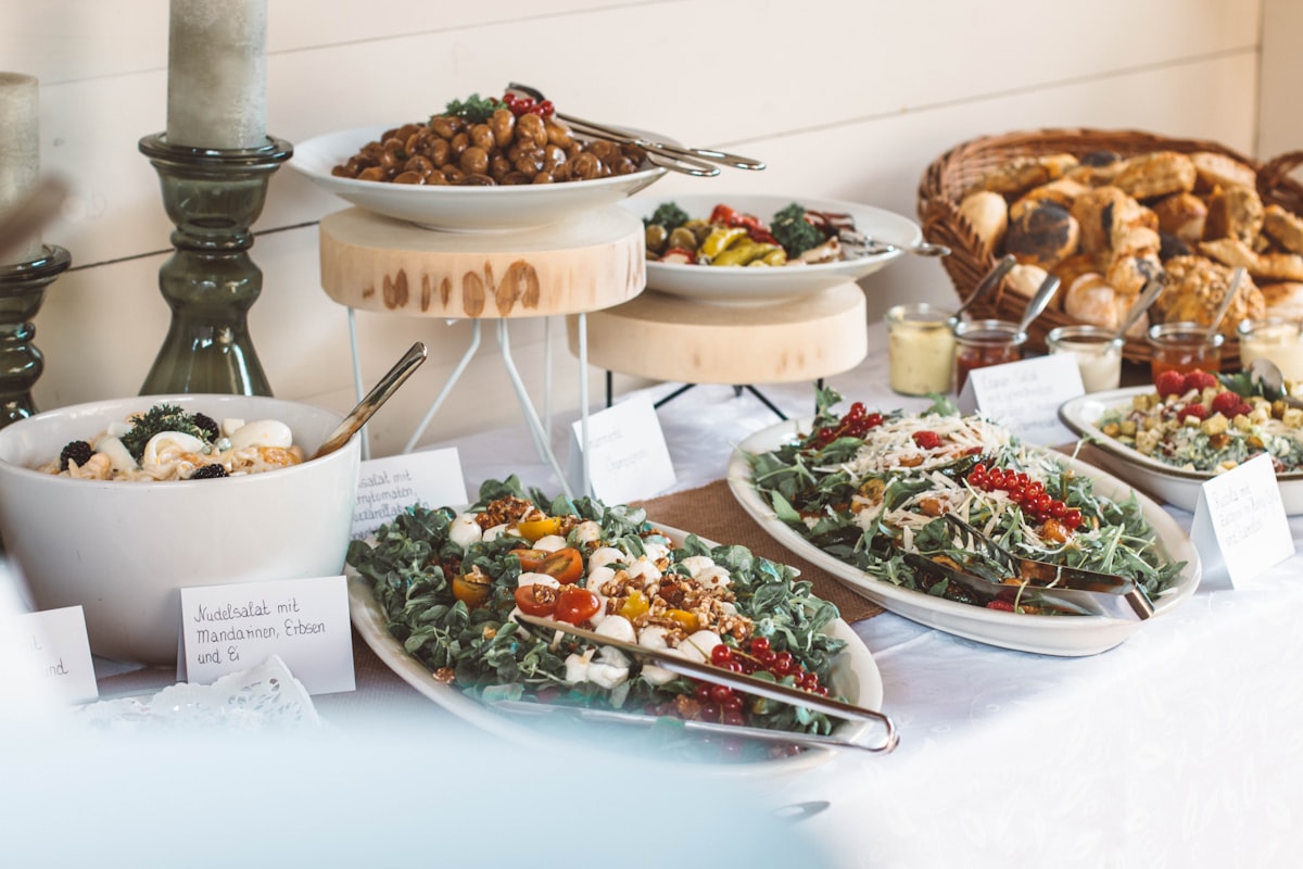 assorted food on white ceramic plates related to 10 Essential Shopping Tips to Buy Perfect Buffets or Sideboards