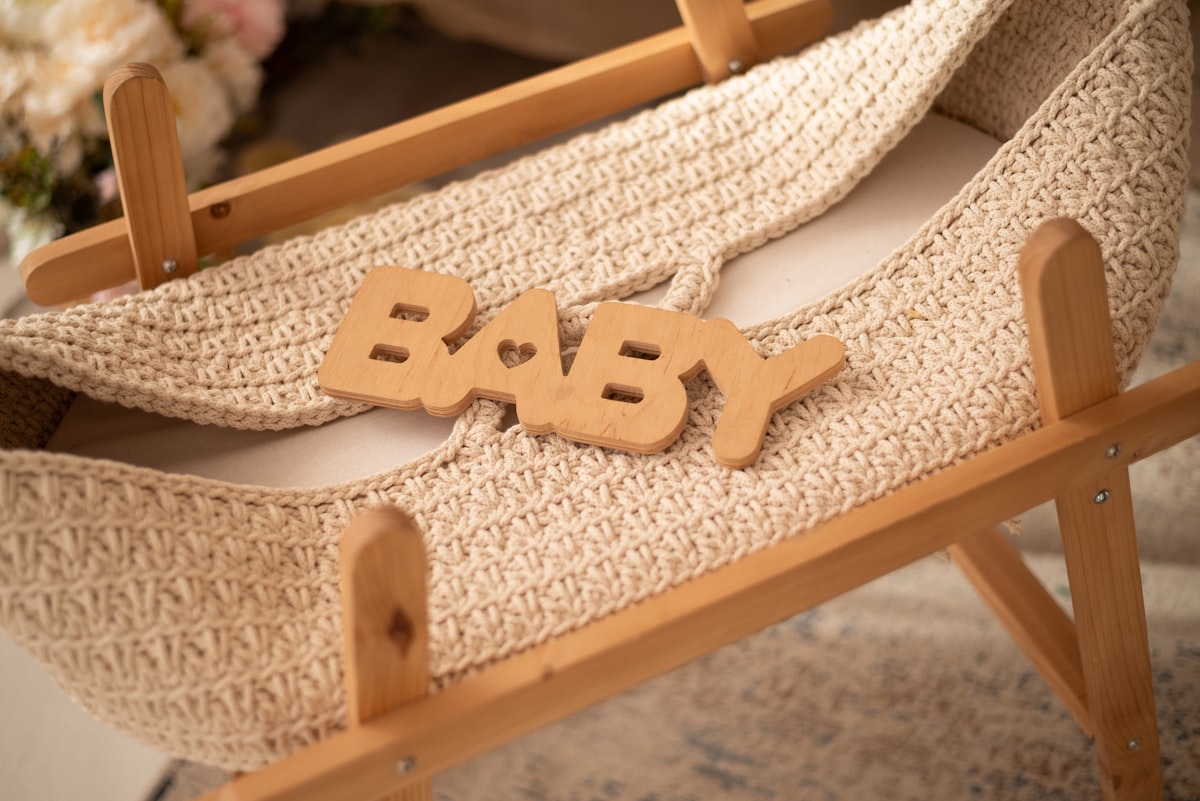 Baby's cradle is ready for a newborn. related to The Ultimate Guide to Baby Beds for Dolls: Choosing the Perfect Miniature Crib