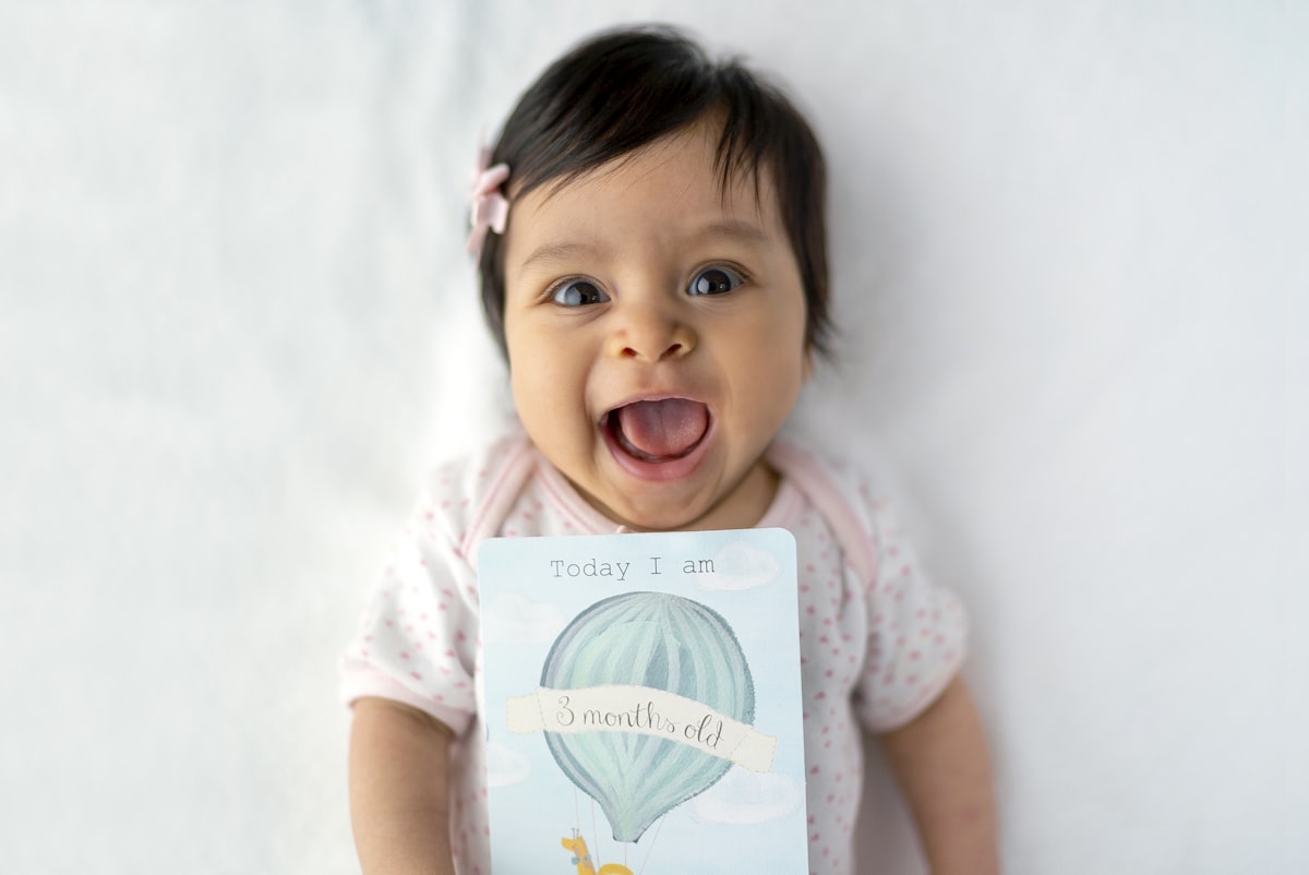 baby with 8 months old card related to Trunkful of Dreams: Unique Baby Elephant Crib Bedding