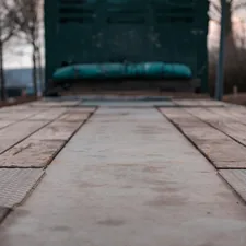 backside of a trailer connected to a 18 wheeler related to The Ultimate Protection: Rubber Truck Bed Mats