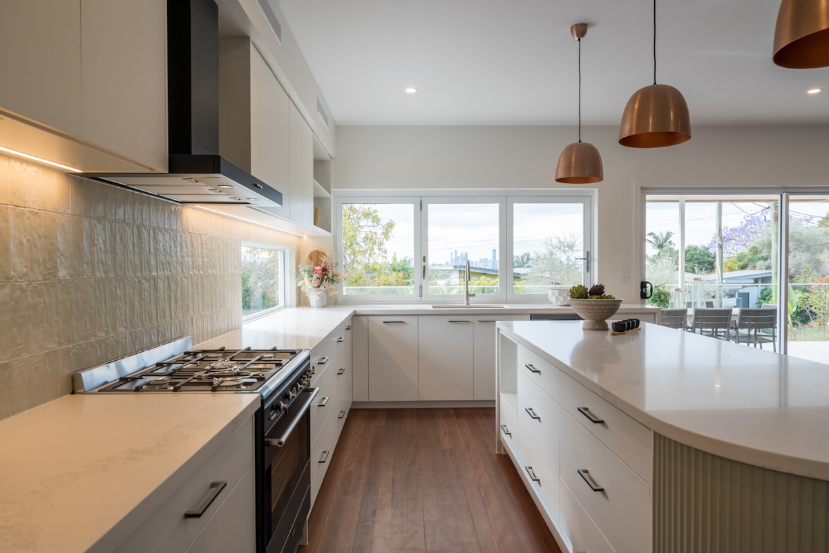 Beautiful kitchen design filled with plenty of natural light and warmth related to Adding the Perfect Touch: A Guide to Kitchen Window Valances