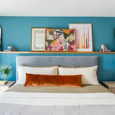 Bedroom bathed in soft sunlight through a large window and two sleek lamps on nightstands provide a gentle ambiance, perfect for relaxation and peaceful sleep! related to Complement Your Bedroom Decor with Valances, Bed Bath and Beyond