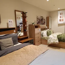 Bedroom furniture sets are displayed in a store. related to Find Your Dream Bed: Top Beds for Sale