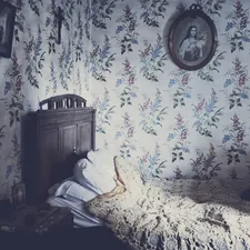 beige bedspread on brown wooden bed frame inside the room with photo frame related to Cozy Up Your Bedroom with Country Bedding Sets