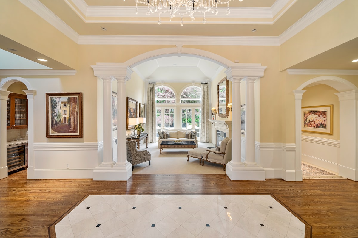 beige fabric sofa inside room related to Maximizing Impact: Entryway Designs for Small Spaces