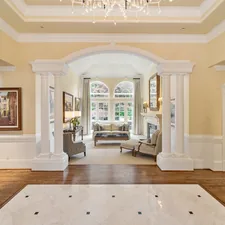 beige fabric sofa inside room related to Maximizing Impact: Entryway Designs for Small Spaces