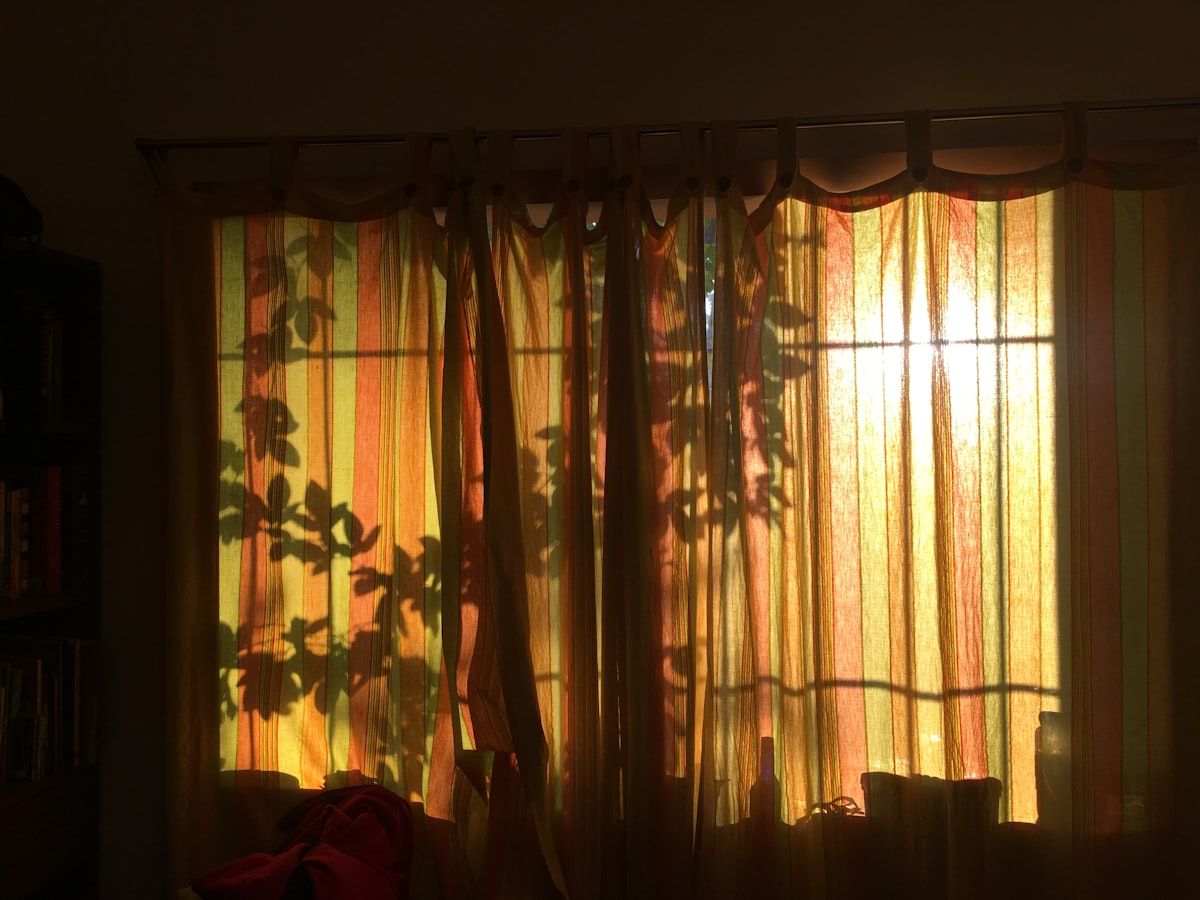 beige window curtain during daytime related to Dress Up Your Windows with a Shimmering Silver Window Valance