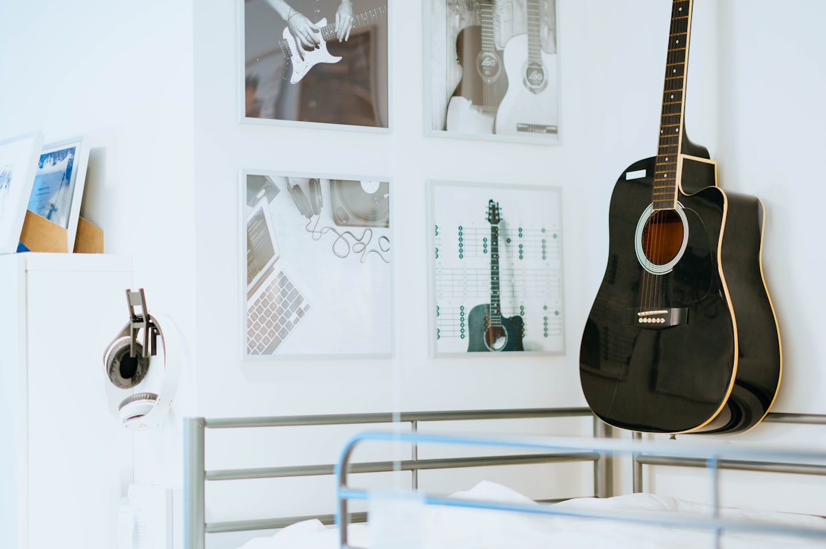 black acoustic guitar related to Transform Your Bedroom with Music-Themed Bedding: Top Ideas for Music Lovers