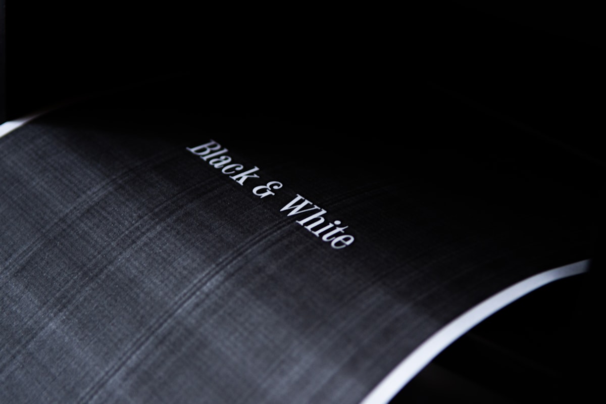 black and white plaid textile related to Elegance in Simplicity: Black and White Striped Window Valance