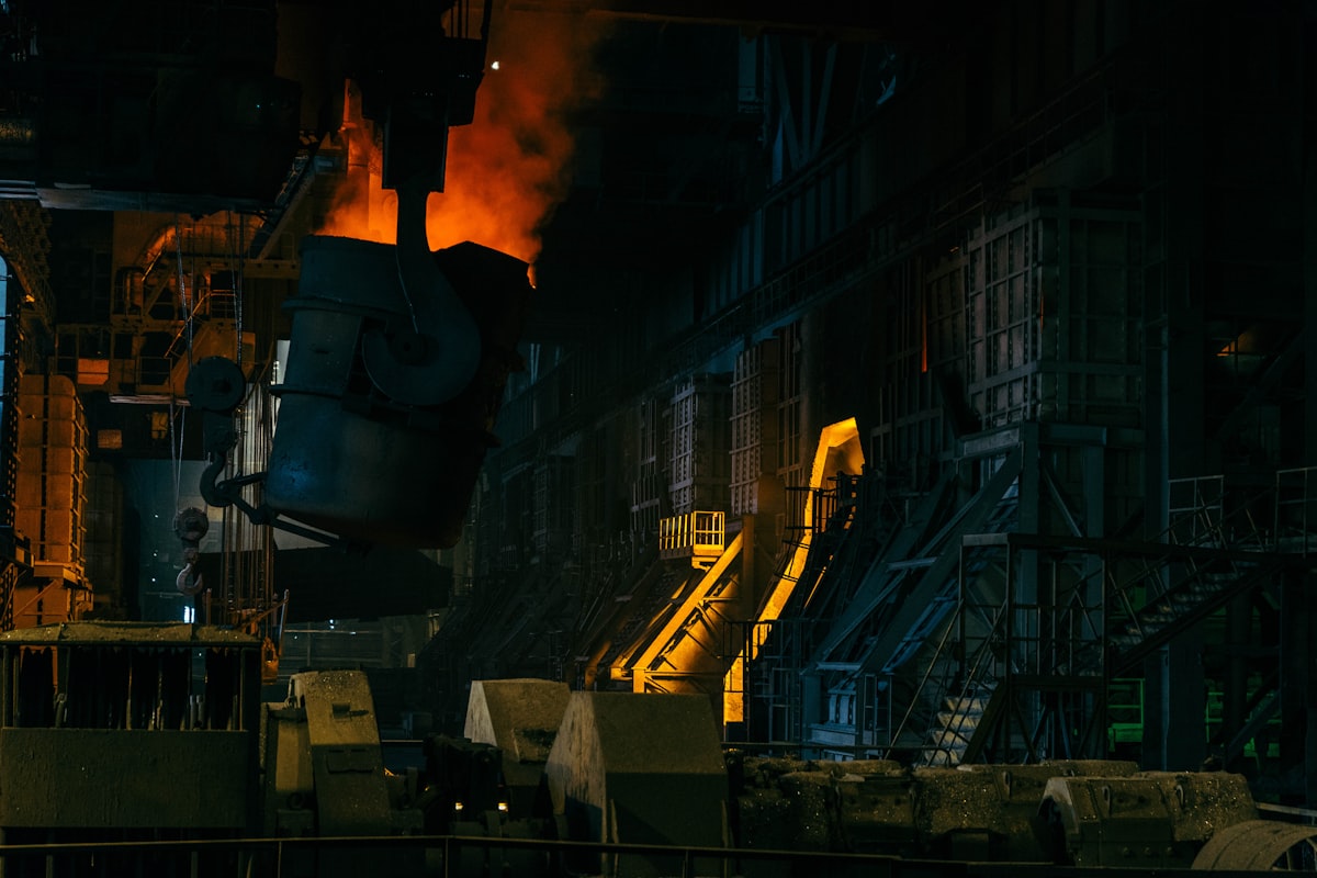 black and yellow factory smoke related to The Enduring Legacy of Cast Iron Chimineas
