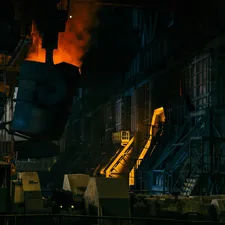 black and yellow factory smoke related to The Enduring Legacy of Cast Iron Chimineas