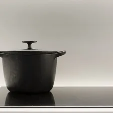 black ceramic bowl with lid related to The Benefits of a Large Cast Iron Chiminea for Your Backyard