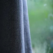 black textile near green grass field during daytime related to Dark Grey Valance: A Timeless and Versatile Window Treatment