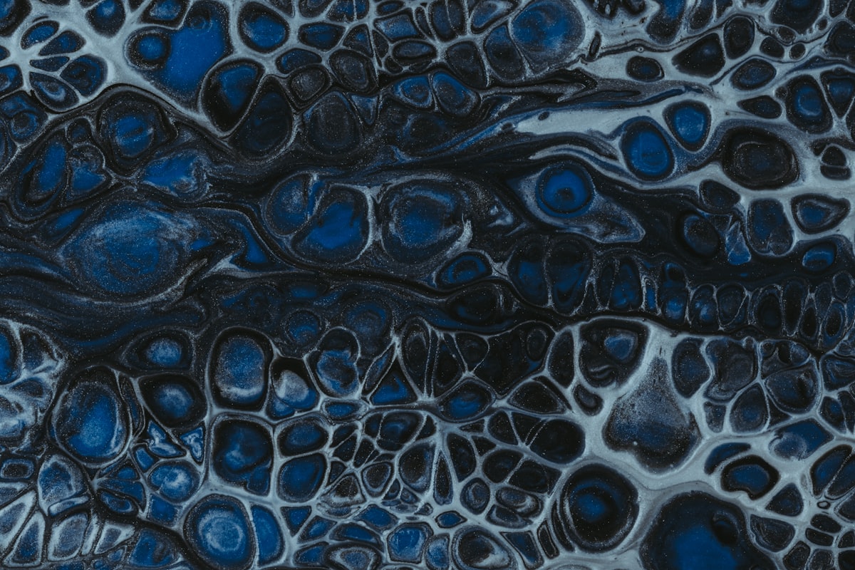 blue and black abstract painting related to Drape in Calm: Navy Blue Coverlets for Serene Sleep