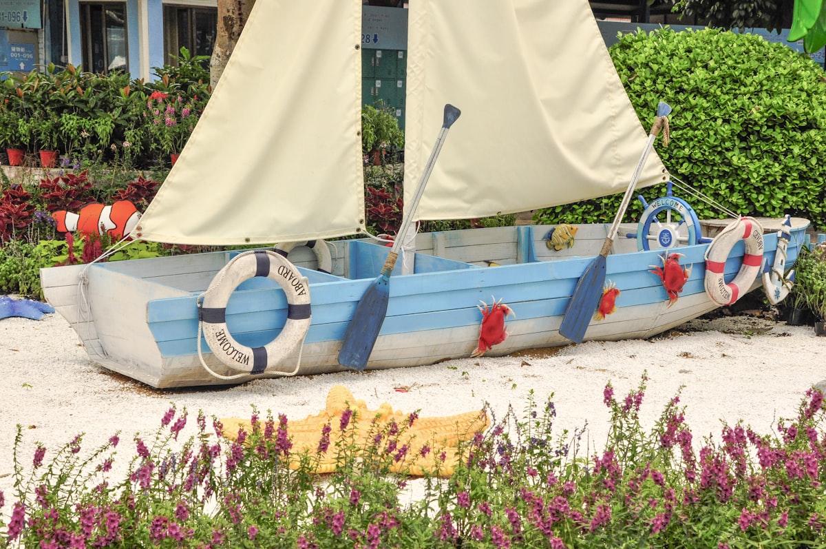 blue and gray boat related to Fun and Creative Beds for Kids