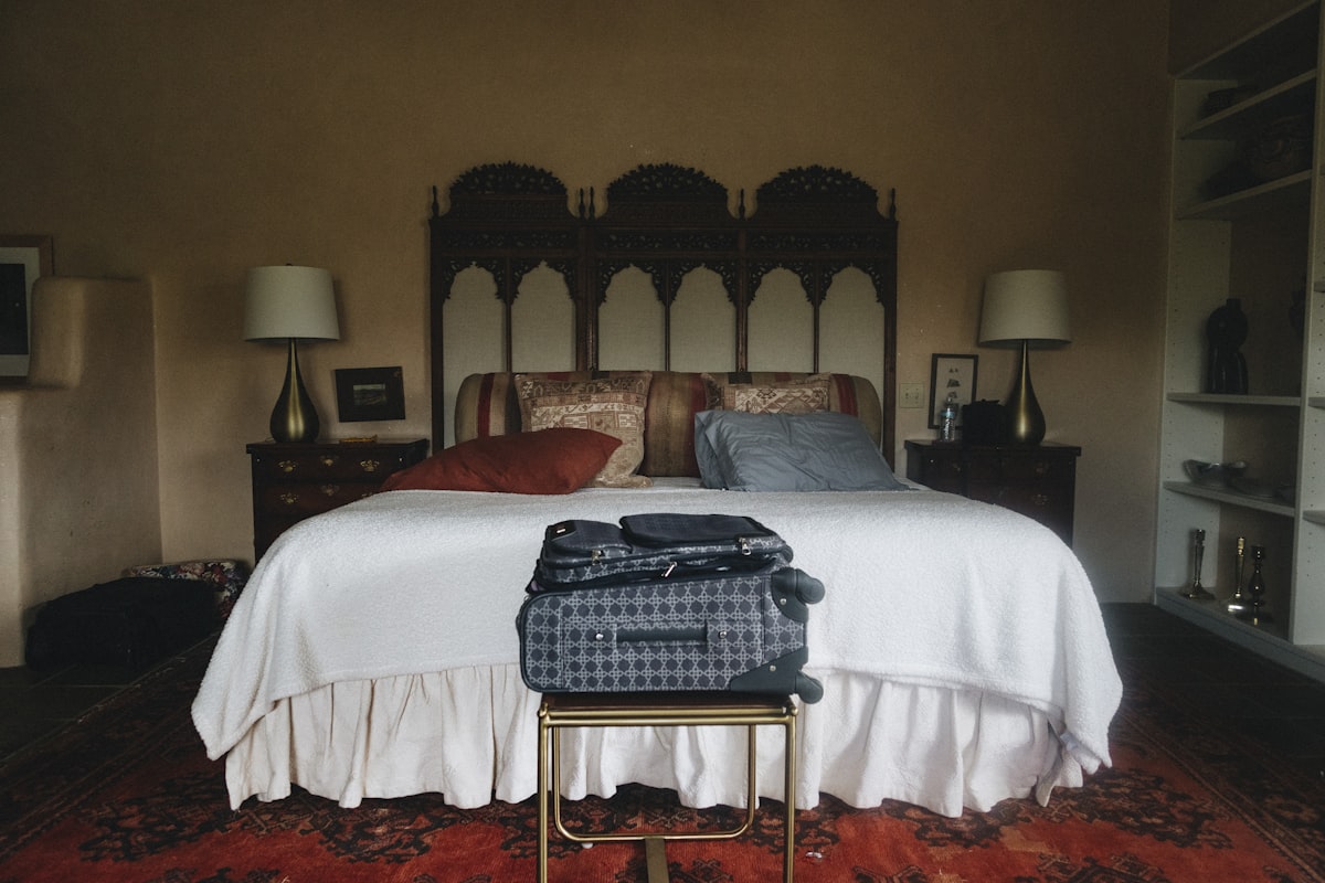 blue and white gingham button up shirt on bed related to Queen-Sized Comfort: The Ultimate Guide to Bed in a Bag Sets