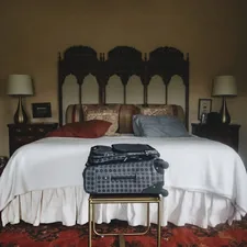 blue and white gingham button up shirt on bed related to Queen-Sized Comfort: The Ultimate Guide to Bed in a Bag Sets