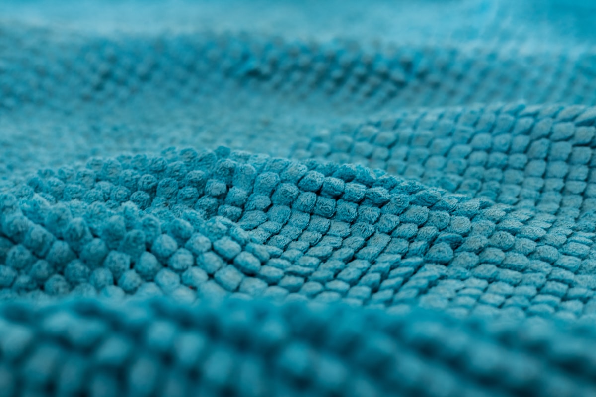 blue and white knit textile related to Elegant Aqua Matelasse Coverlet: Adding a Touch of Sophistication to Your Bed