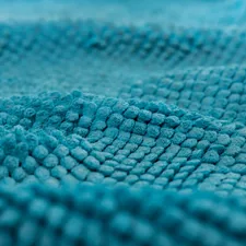 blue and white knit textile related to Elegant Aqua Matelasse Coverlet: Adding a Touch of Sophistication to Your Bed
