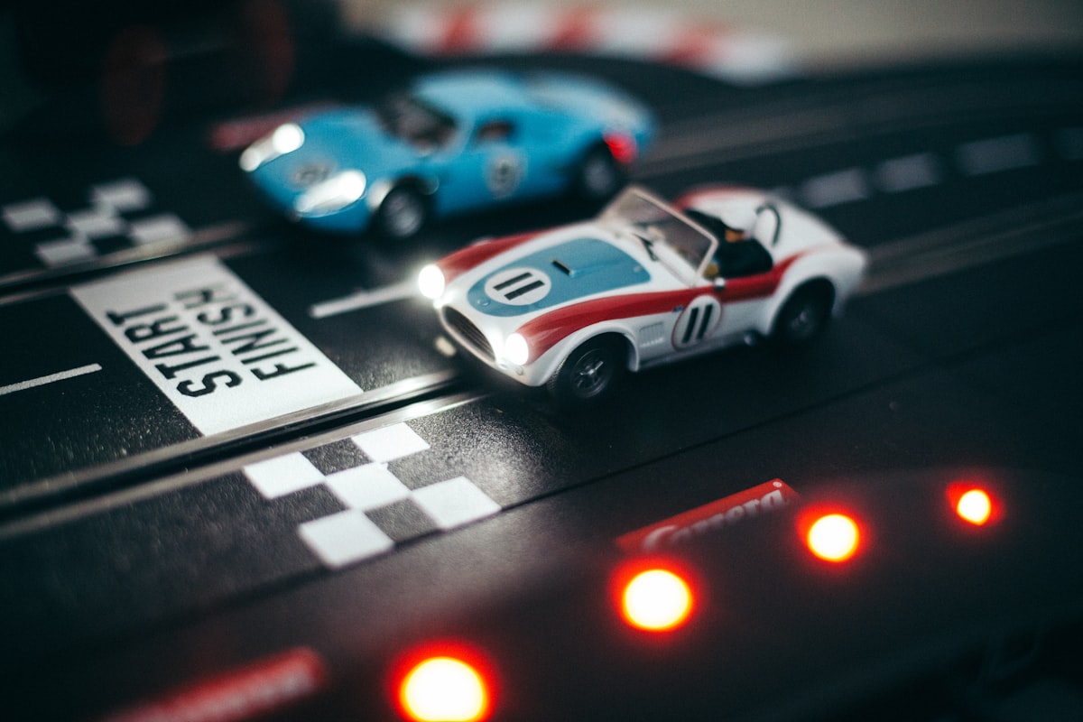 blue and white porsche 911 related to Racing Towards Slumber with the Little Tikes Toddler Race Car Bed