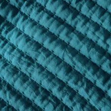 Blue Fabric Textured Material related to The Ultimate Guide to Coverlets King Size