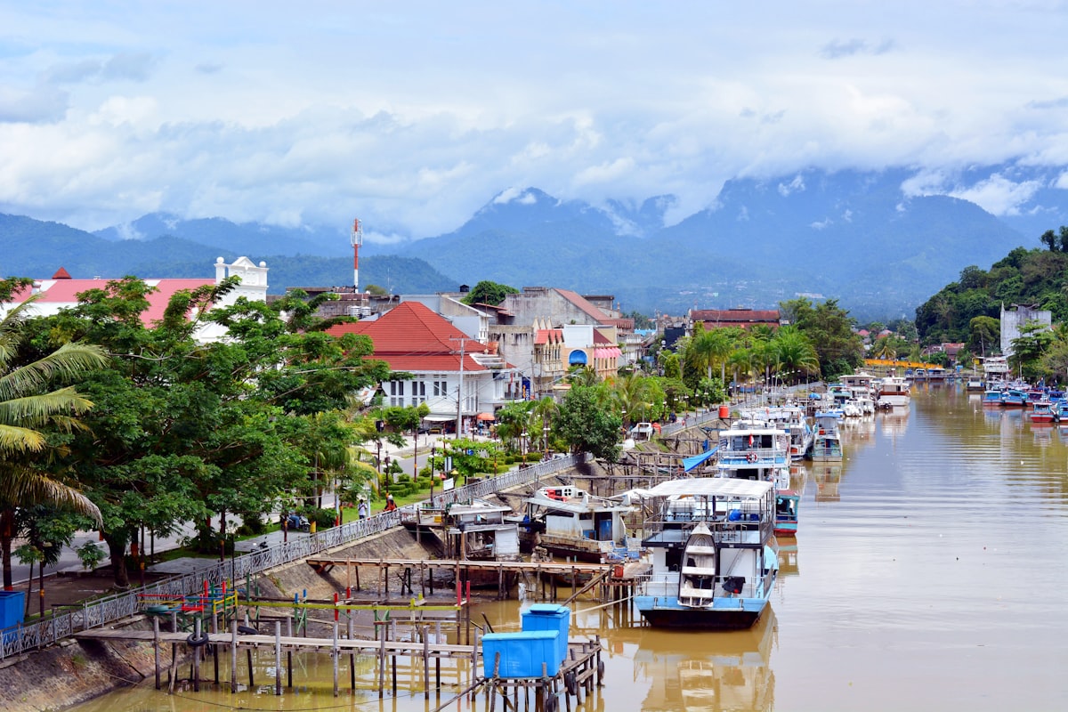 boats on river during daytime related to Explore the Timeless Elegance of the Sumatra Bed