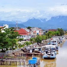 boats on river during daytime related to Explore the Timeless Elegance of the Sumatra Bed