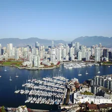 body of water near building during daytime related to Exploring the Charm of Vancouver's Bed and Breakfasts