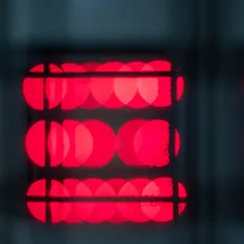 bokeh photography of red lights related to Unlock the Power of Red Light Therapy with a Bed for Total Wellbeing