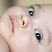 boy's face related to Choosing the Perfect Baby Boy Nursery Bedding Sets for a Dreamy Nursery