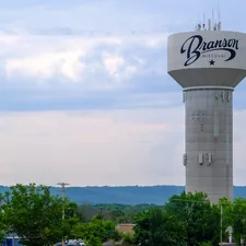 Branson water tower against a cloudy sky related to Exploring the Charm of Branson Bed and Breakfasts