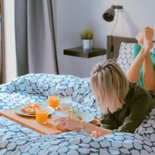 Breakfast in bed related to The Cozy World of Bed and Breakfasts