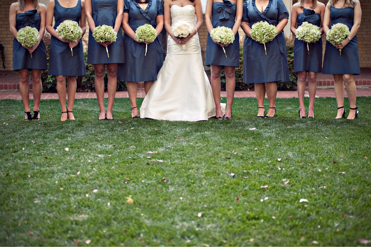 bride and bridesmaids with bouquets related to Navy Blue Valances | Elegant Window Treatments
