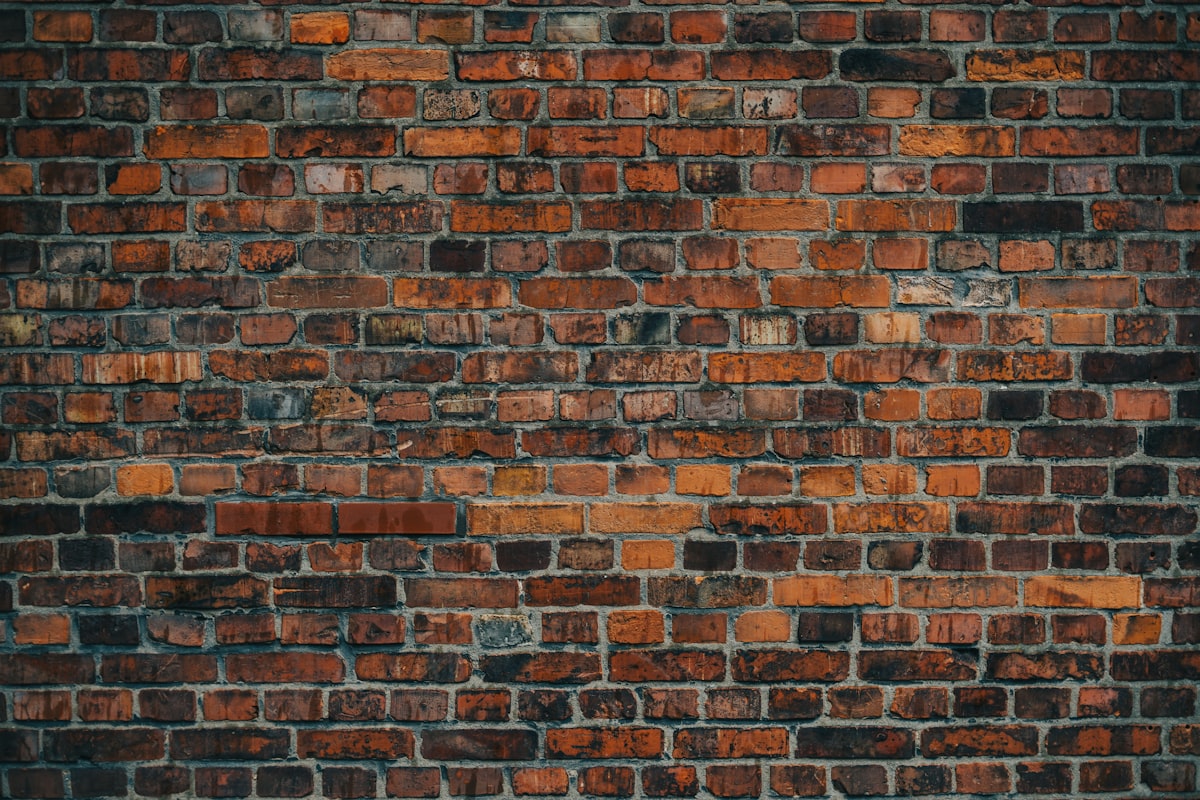 brown and black brick wall related to Building Your Dream Brick Chiminea: A Comprehensive Guide
