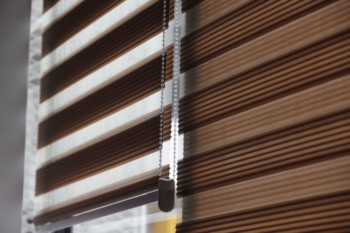 brown window curtain during daytime related to The Ultimate Guide to Wood Blind Valance Clips
