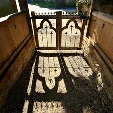 brown wooden fence near green grass field during daytime related to Unlock the Magic: Castle Bunk Bed Essentials