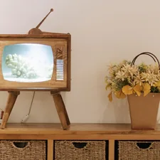 brown wooden framed picture frame on brown wooden table related to Elevate Your Home Theater Experience with TV Sideboards Furniture