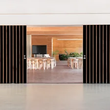 brown wooden table and chairs related to Sliding Door Valance: Elevate Your Room's Style