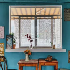 brown wooden table with brown wooden chair related to DIY Window Valance: Transform Your Windows with Style