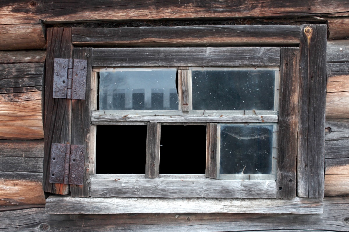 brown wooden window frame during daytime related to The Ultimate Guide to Country Valances for Windows