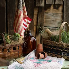 brown woven basket on white and red textile related to Primitive Country Valances