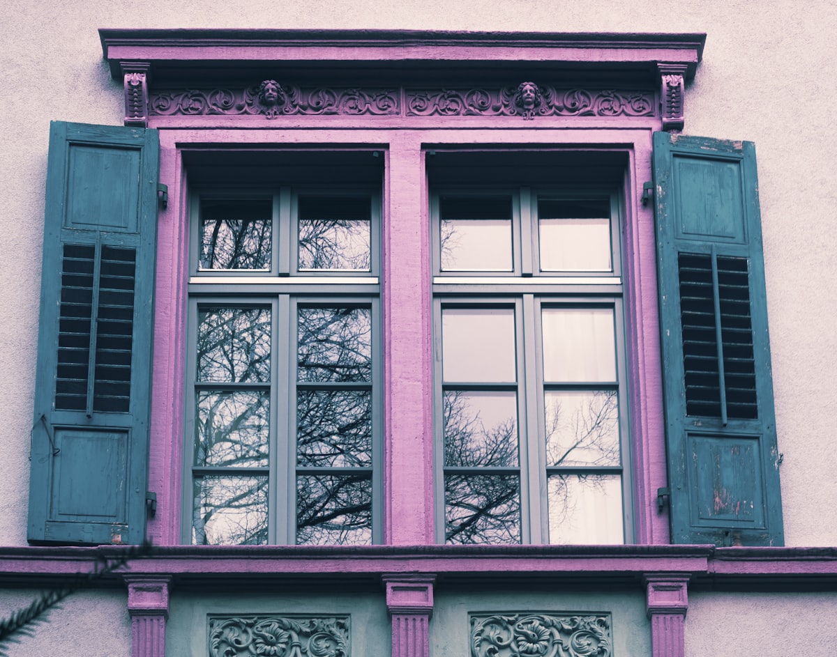 building with closed window related to Elevate Your Windows with Chic White Tab Top Valance